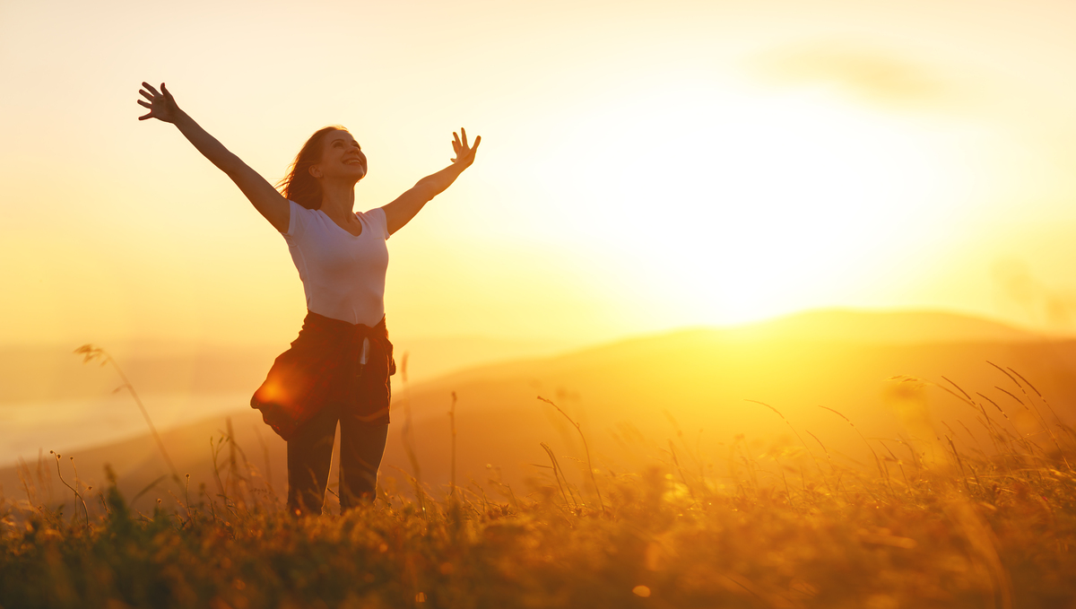 Happy,Woman,On,The,Sunset,In,Nature,In,Summer,With